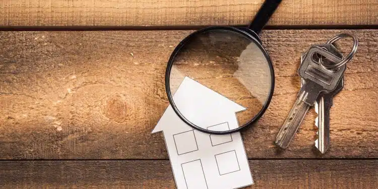 paper house with Magnifying Glass